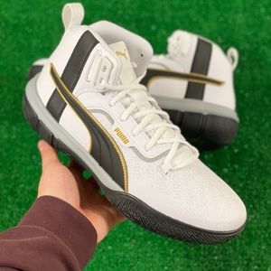 black and gold pumas